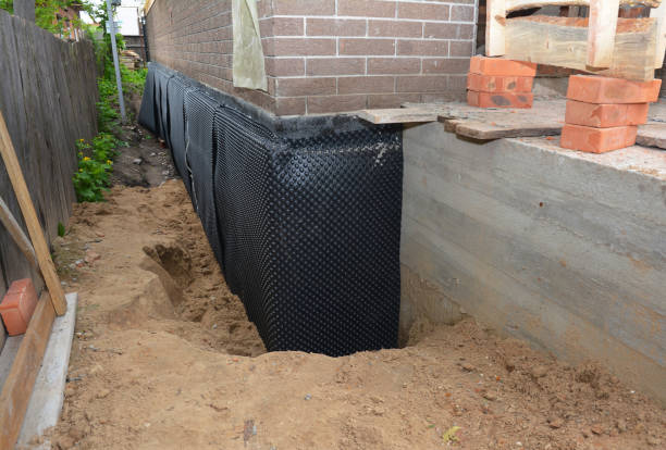 SJ Waterproofing Pros technician performing targeted Vapor Barrier Installation assessment in Conasauga, TN